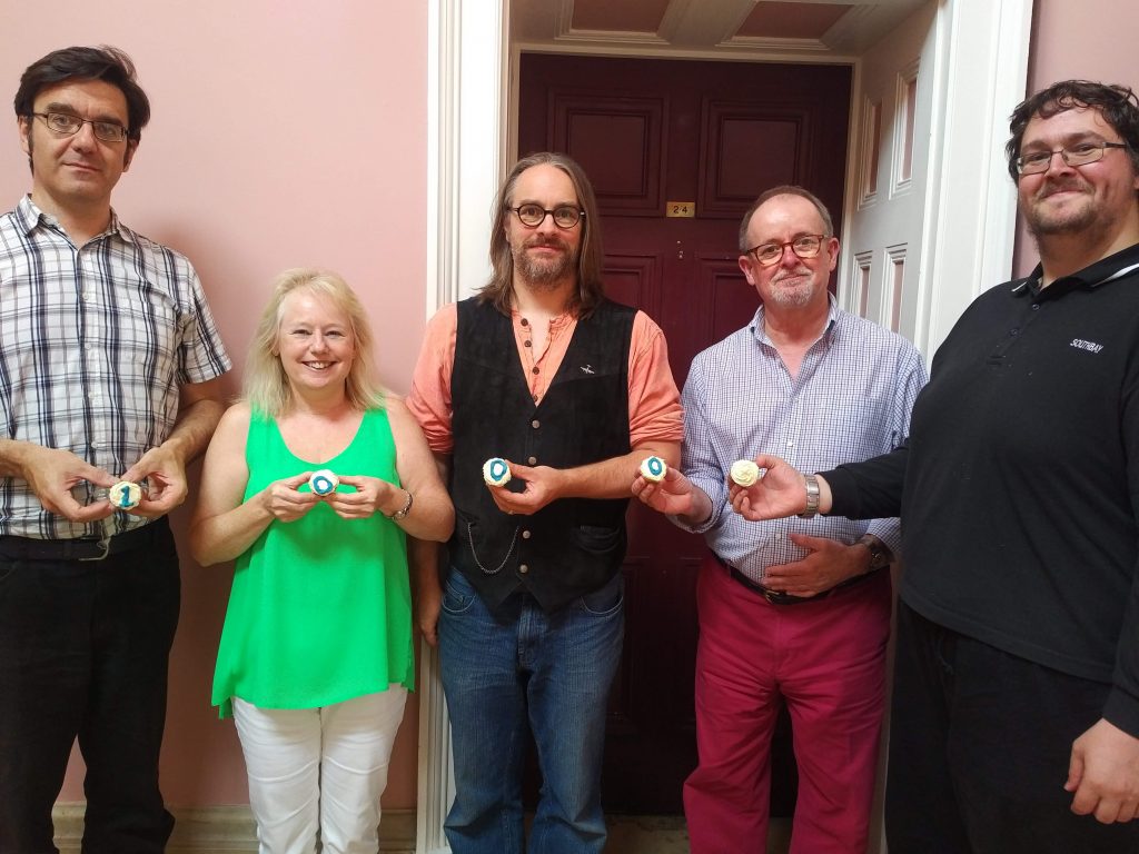 Staff of the Digital Archive celebrate ingesting the one thousandth interview, August 2018. From left: Alex Pesaro, Helen Durham, Dan Ellin, Peter Jones, Robin Evans. Photo: H. Hughes.